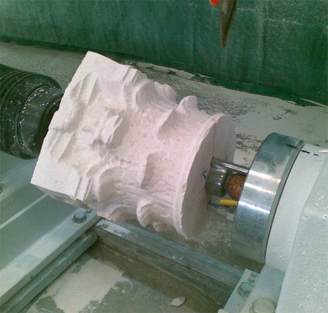 Manufacturing of a marble capital.  =>Following