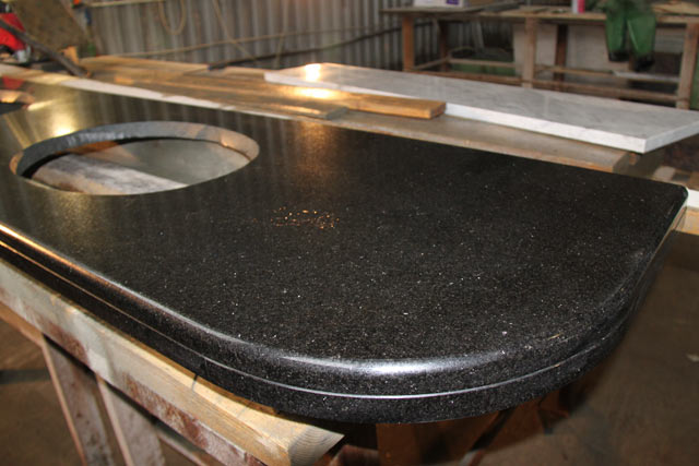 Manufacturing of a stone table-top for a bathroom  =>Following