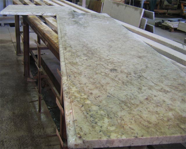 Kitchen table-top in the course of manufacturing. Granite White Galaxy, Brazil.  =>Following