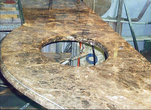 Manufacturing of a table-top from marble Imperiador, Spain.  =>Following